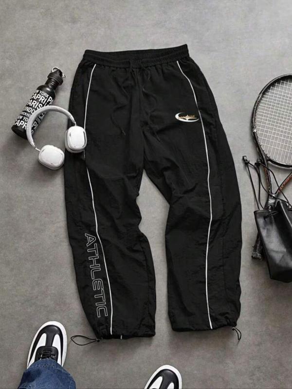 Pantalones largos deportivos casuales para hombre, corte holgado, puños elásticos, estampado a la moda, tela ligera, perfectos para uso diario